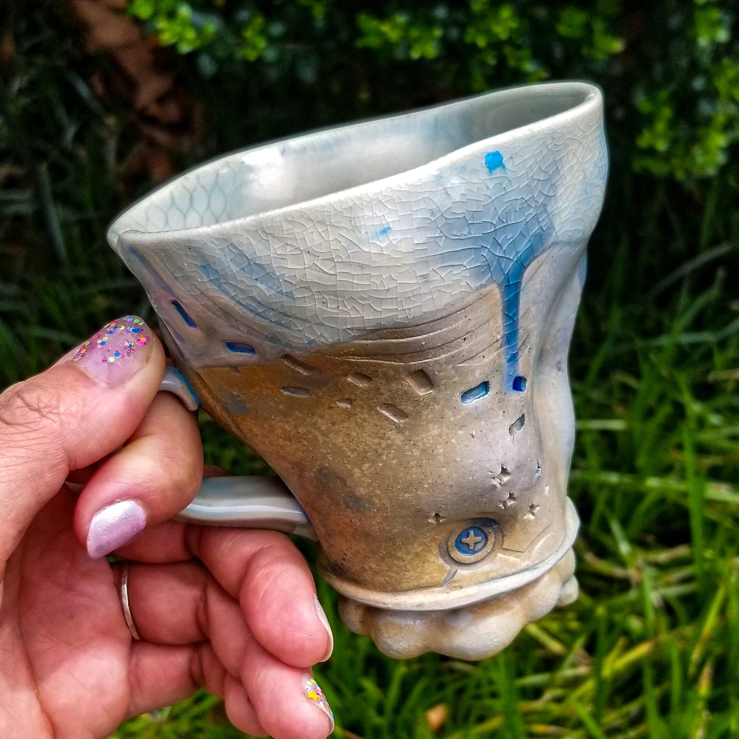 Handmade stoneware ceramic soda fired mug blue color with pressed textures