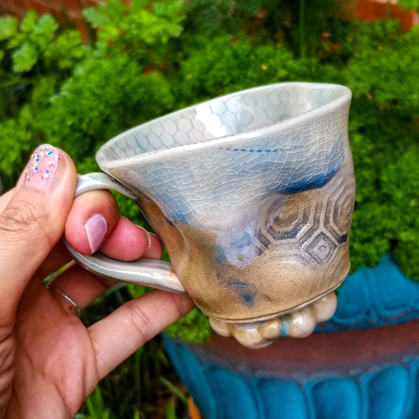 Handmade stoneware ceramic soda fired mug blue color with pressed textures