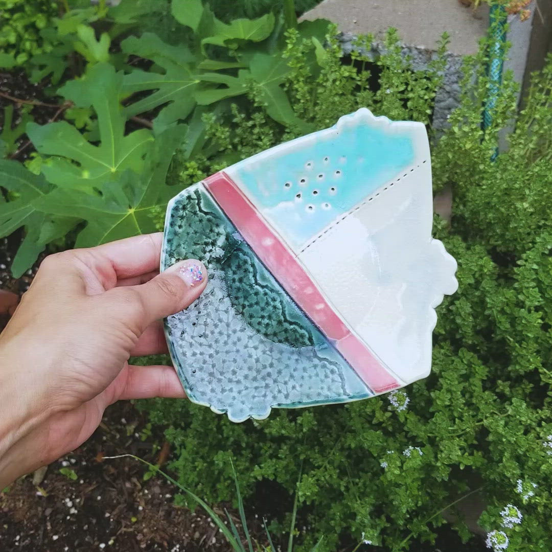 Video of handmade porcelain ceramic soda fired dish multi color with pressed textures