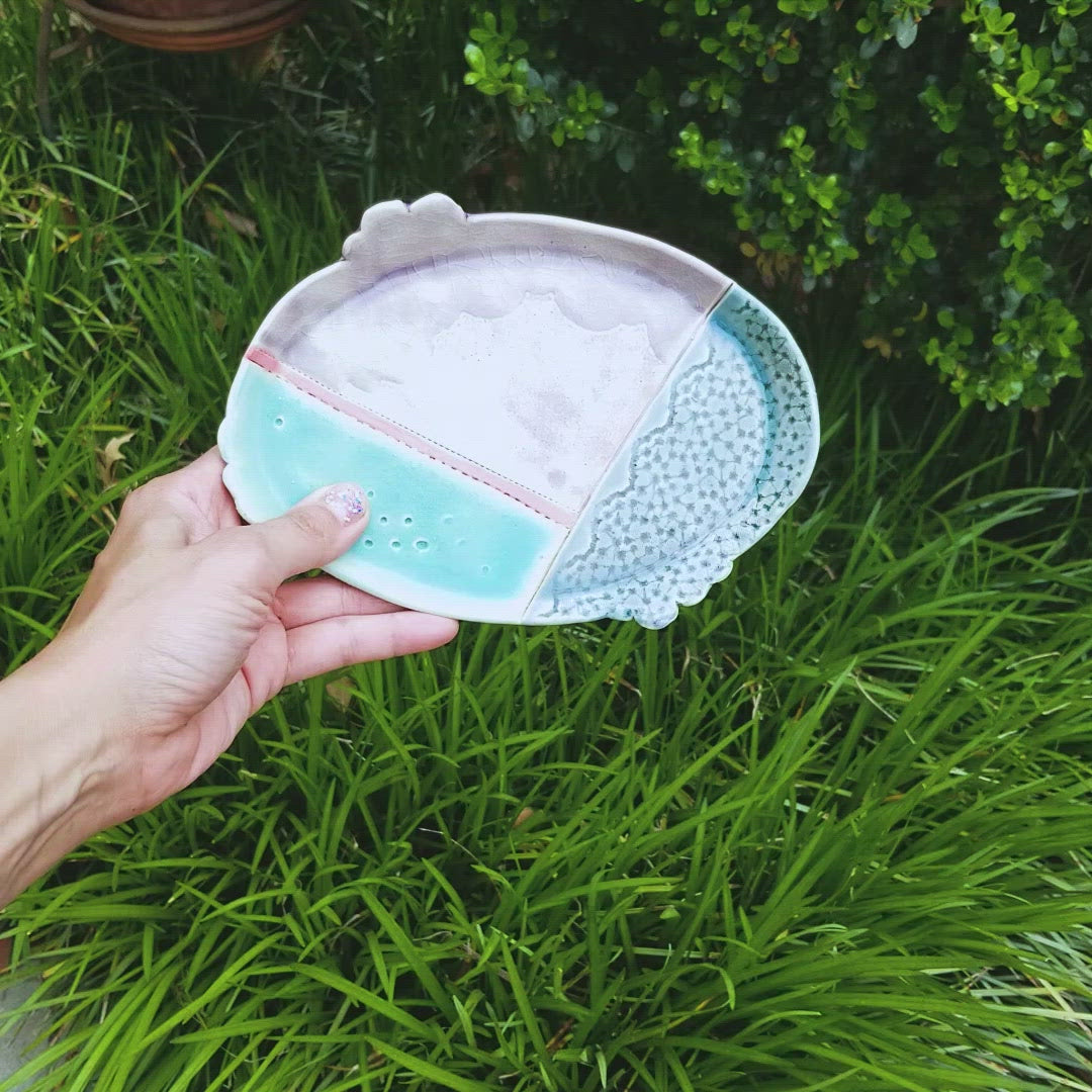 Video of handmade porcelain ceramic soda fired oval tray dish multi color with pressed textures