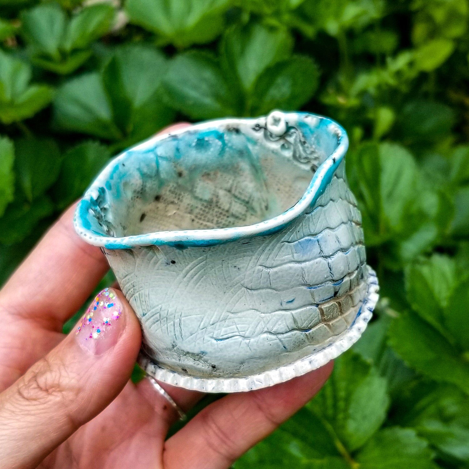 Handmade stoneware ceramic soda fired cup blue color with pressed textures