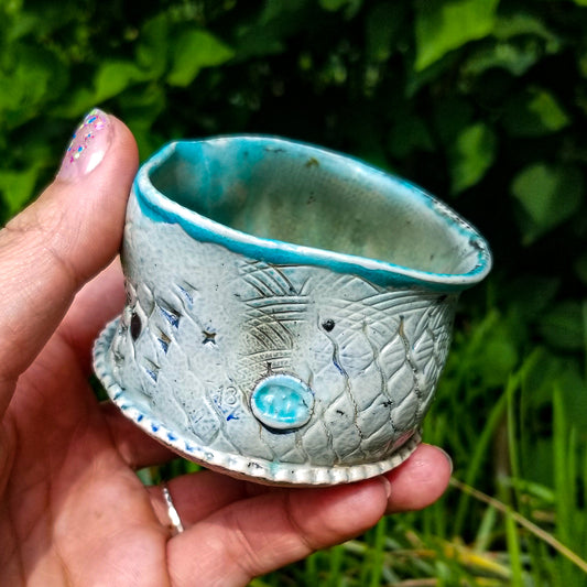 Handmade stoneware ceramic soda fired cup blue color with pressed textures
