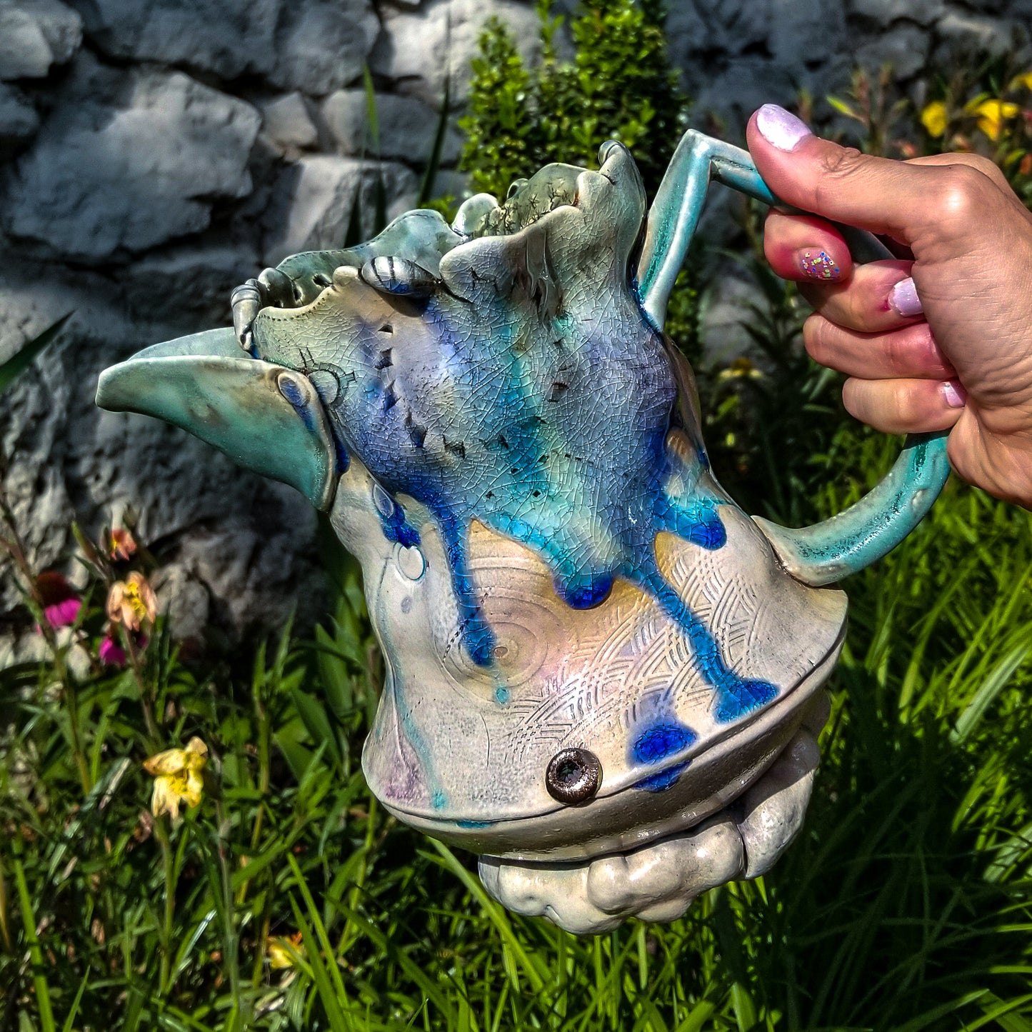 Handmade stoneware ceramic soda fired pitcher blue color with pressed textures