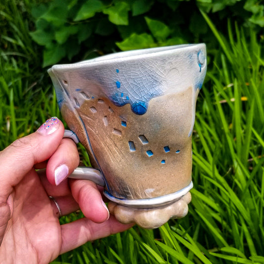 Handmade stoneware ceramic soda fired mug blue color with pressed textures