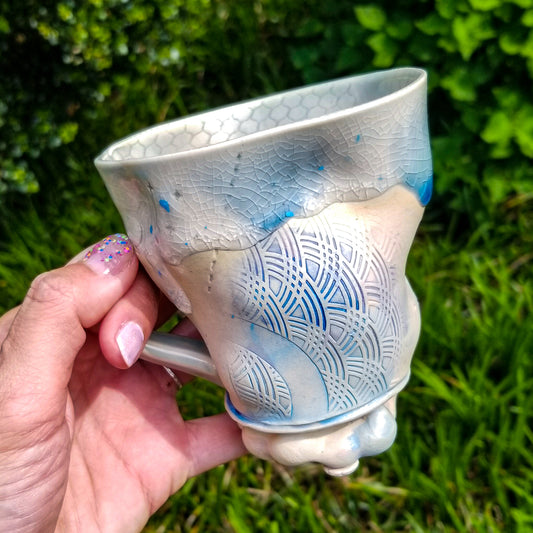 Handmade stoneware ceramic mug blue color with pressed textures