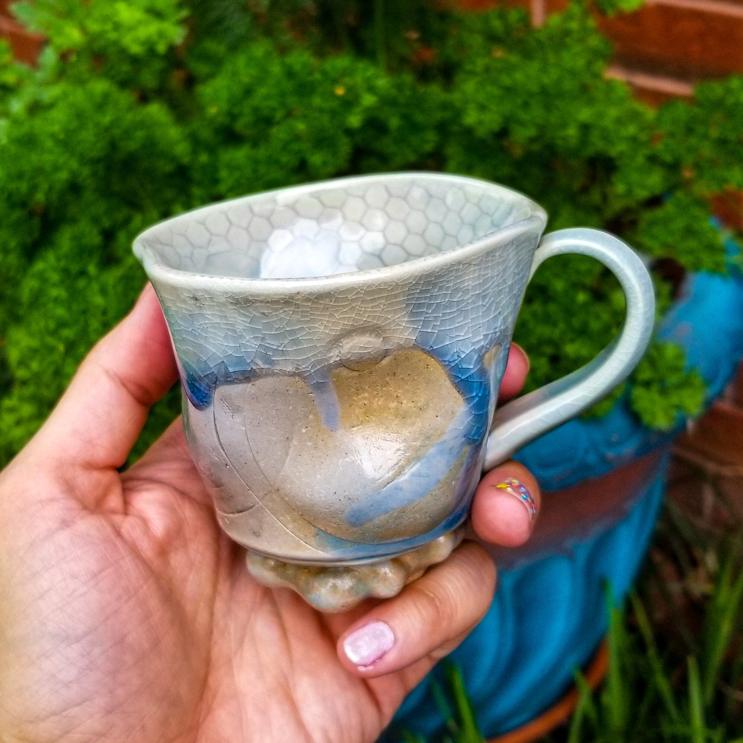 Handmade stoneware ceramic soda fired mug blue color with pressed textures
