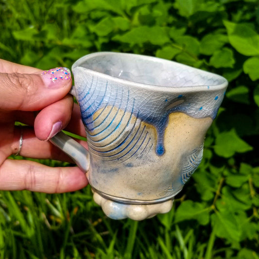 Handmade stoneware ceramic soda fired mug blue color with pressed textures