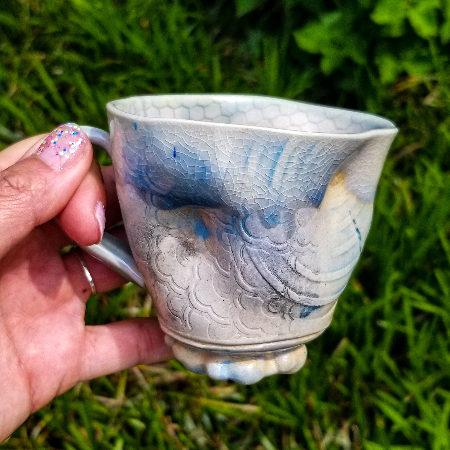 Handmade stoneware ceramic soda fired mug blue color with pressed textures