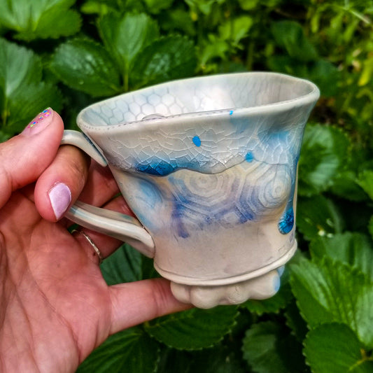Handmade stoneware ceramic mug blue color with pressed textures
