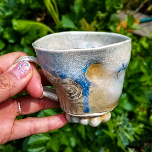Handmade stoneware ceramic soda fired mug blue color with pressed textures