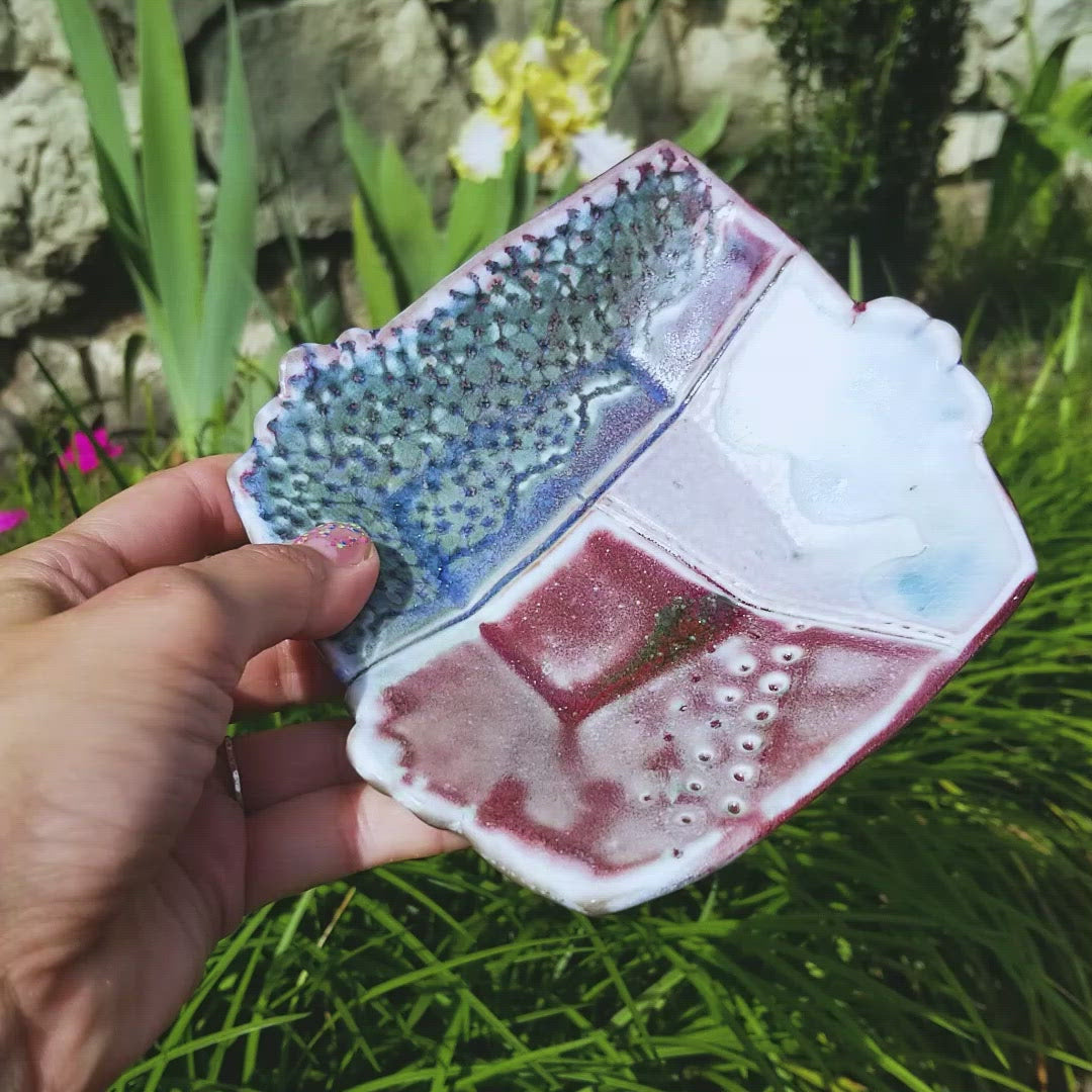 Video of handmade porcelain ceramic soda fired dish multi color with pressed textures